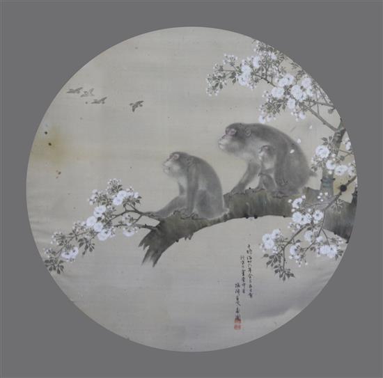 A Japanese watercolour on silk of two monkeys, Meiji period, 61cm diameter